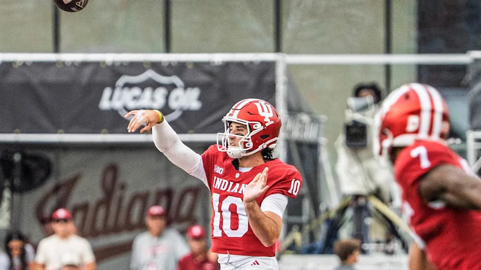 Indiana quarterback Josh Hoover throws a pass during game action